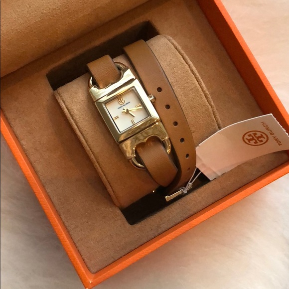 Tory Burch Accessories - HP pick ❤️Tory Burch gold watch with leather band
